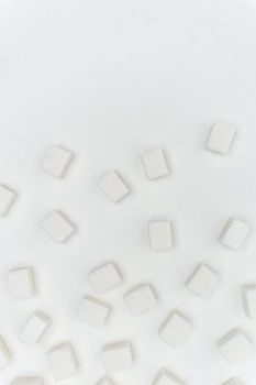 sugar cubes on a light background Glucose ingredient. High quality photo