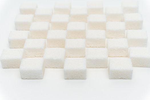 sugar cubes staggered Glucose refined food ingredient. High quality photo