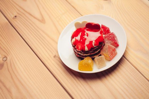 sweets marmalade cakes wooden background snack for tea. High quality photo