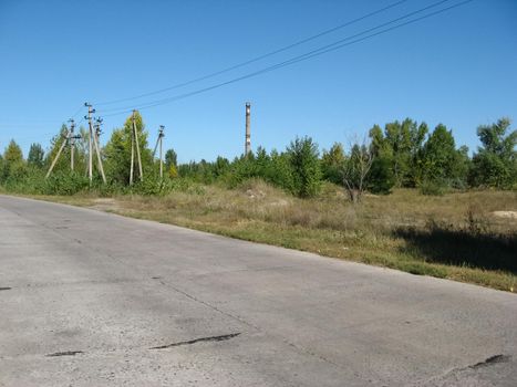 The old road is made of concrete slabs. road surface slabs of concrete.