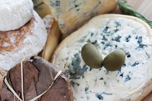 Blue Cheese assortment and Olives composition french cheese gourmet market