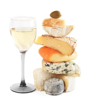 Stack of assorted cheese and white wine isolated on white background french cheese gourmet choosing concept
