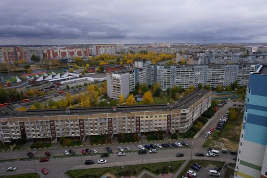 Metropolis. Large apartment buildings in the city by the river.