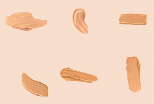 Liquid foundation smudges, smears and strokes as makeup textures isolated on beige background, beauty and cosmetics set