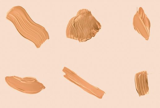 Liquid foundation smudges, smears and strokes as makeup textures isolated on beige background, beauty and cosmetics set