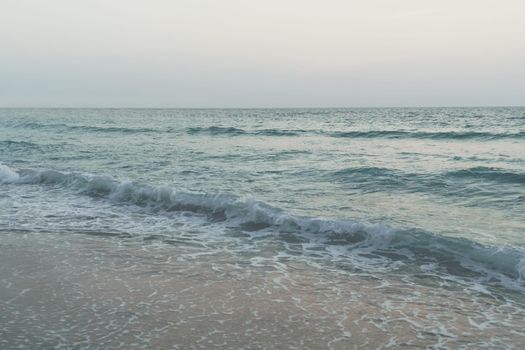 Film vintage fade tone of ocean sea wave beach summer background landscape on vacation day. 