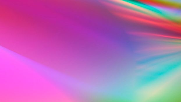Abstract blurred rainbow background with texture.