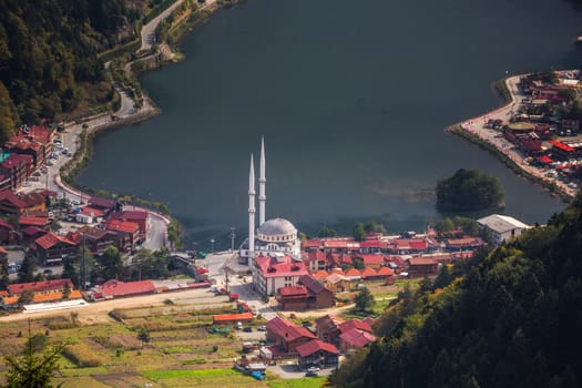 View of the mosque on the shore of the mountain lake Uzungol, Trabzon, Turkey.