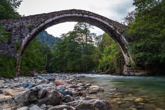 Famous senyuva cinciva stone bridge on the storm valley Firtina vadisi, Rize, Turkey.