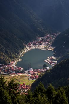 View of the mosque on the shore of the mountain lake Uzungol, Trabzon, Turkey.