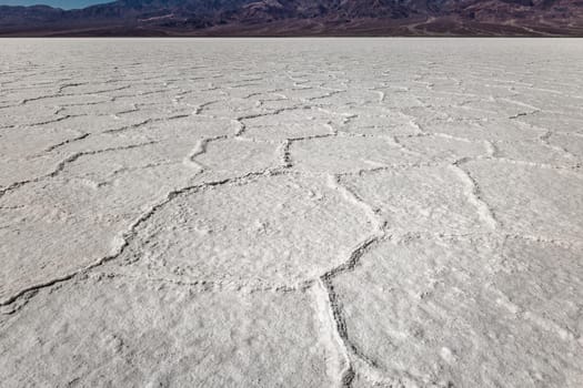 Death Valley salt flats near the badwater area of the national park. The crusted salt rises to the desert surface and bakes in the sun.