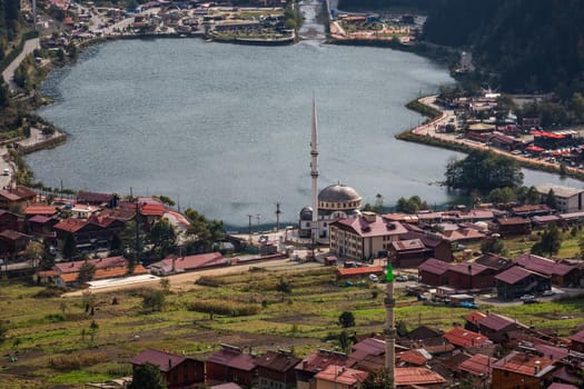View of the mosque on the shore of the mountain lake Uzungol, Trabzon, Turkey.