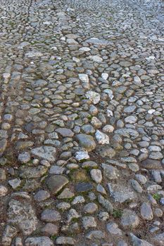 Old stone paved road in Gerona, Catalonia, Spain