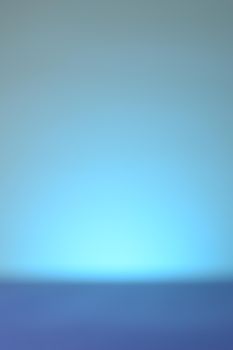 An abstract blue blurred background for use in design work or page layouts.