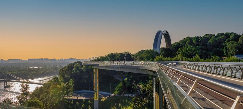 Kyiv, Ukraine 07.11.2020. Pedestrian glass bridge in Kyiv, Ukraine, on a sunny summer morning