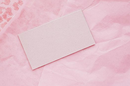 Business card flatlay on pink tissue paper background, luxury branding flat lay and brand identity design for mockups