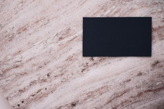 Black business card flatlay on stone background, luxury branding flat lay and brand identity design for mockups