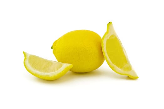 Whole and sliced ripe lemon fruit isolated on white background