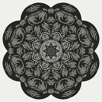 Beautiful and elegant monochromatic symmetrical mandala designs on solid sheet of wallpaper. Concept of home decor and interior designing