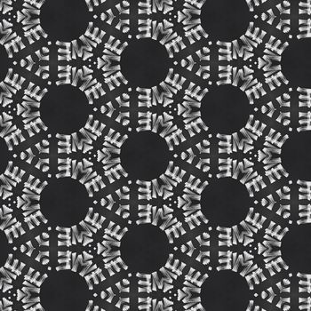 Beautiful black and white symmetrical designs on solid sheet of wallpaper. Concept of home decor and interior designing