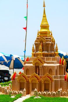 Gold sand pagoda in Songkran festival represents In order to take the sand scraps attached to the feet from the temple to return the temple in the shape of a sand pagoda