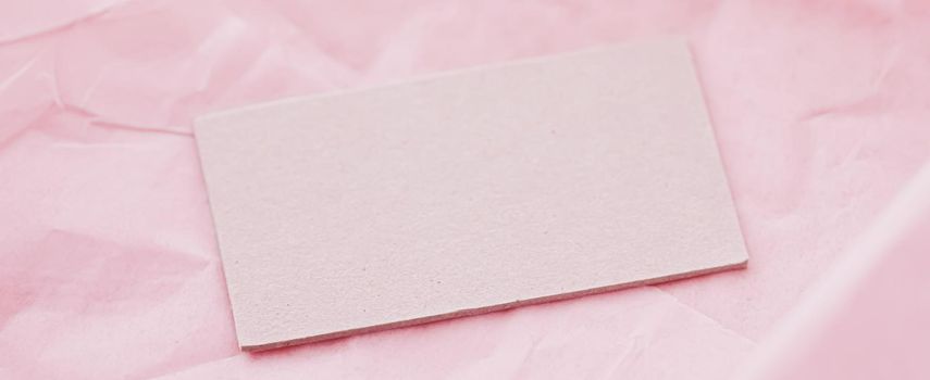 Business card flatlay on pink tissue paper background, luxury branding flat lay and brand identity design for mockups