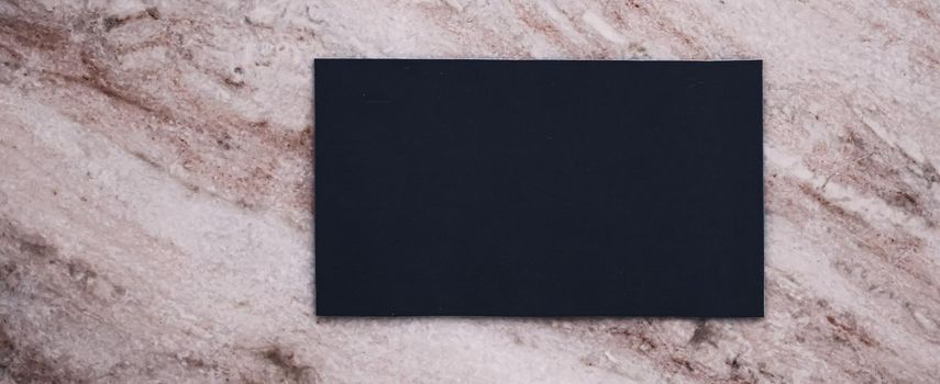 Black business card flatlay on stone background, luxury branding flat lay and brand identity design for mockups