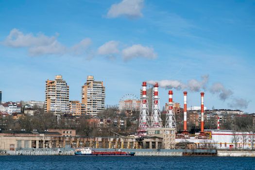 smoking chimneys on the background of the city. High quality photo