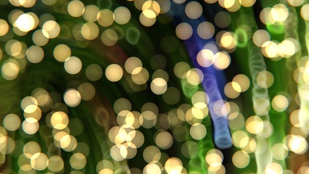 Abstract textured green background with yellow bokeh. Design, art