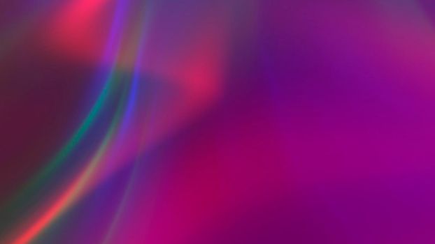 Abstract blurred rainbow background with texture.