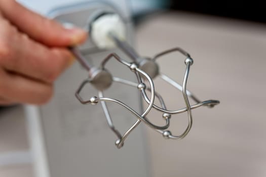 Making of a cream for home-made cakes with a mixer.