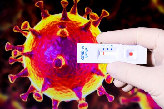 Medical worker holding negative rapid Diagnostic Test cassette identifying antibodies for Coronavirus SARS-CoV-2 COVID-19 on microscopic image of covid virus