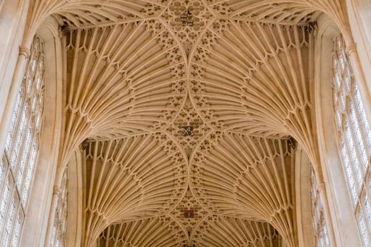 Detail of the gothic stone vault at Bath Abbey on a sunny day