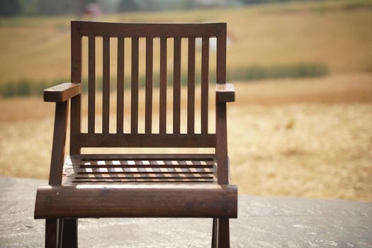 wooden chair on balcony terrace patio for resting