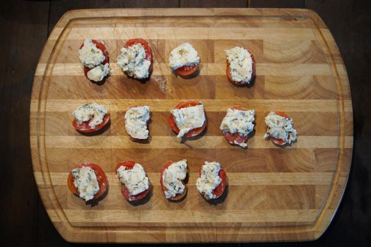 tomatoes with farmer paneer cottage cheese. vegetarian meal snack appetizer.