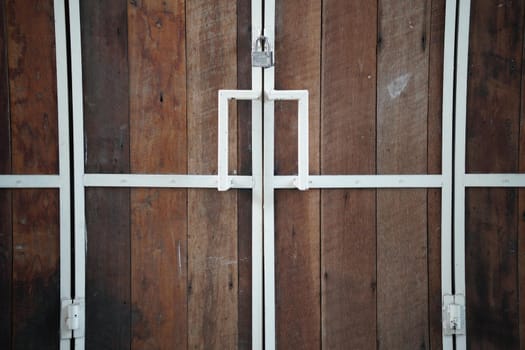 brown wood planks door texture with natural pattern abstract background for design and decoration