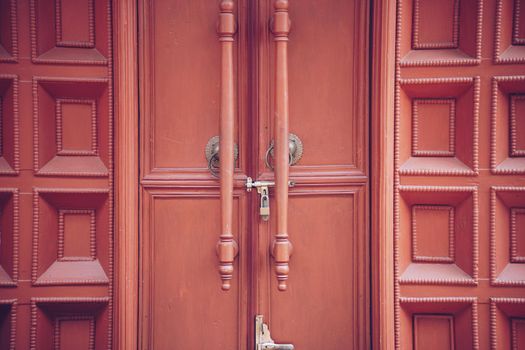 brown wooden door entrance doorknob handle wall for background