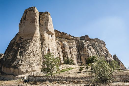 Detail of the ancient castle of Cavusin dug from a mountains, Cappadocia, Turkey