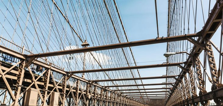 Brooklyn Bridge is a hybrid cable-stayed suspension bridge in New York City and is one of the oldest bridges of either type in the United States