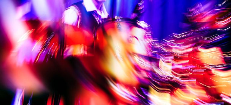 Musician with drums. Abstract image of a drummer at concert. The Sound of Music concept. Intentional motion blur