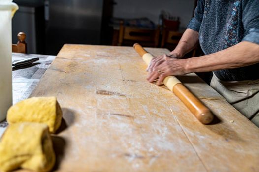 detail roll out the dough with a rolling pin and then make tagliatelle