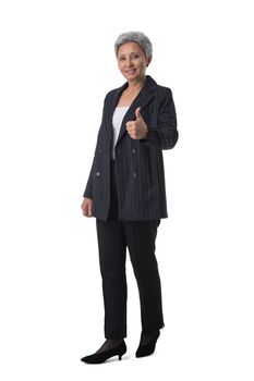 Full length portrait of happy beautiful mature asian woman with thumb up isolated on white background, business people