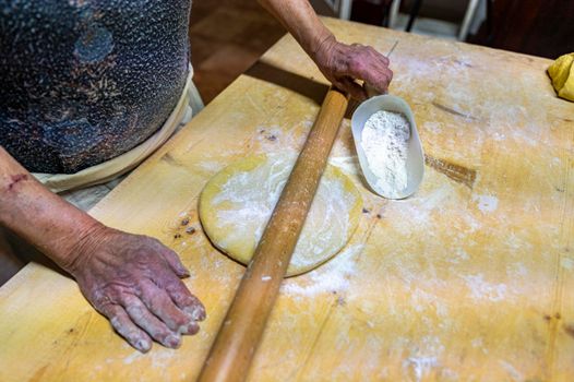 detail roll out the dough with a rolling pin and then make tagliatelle