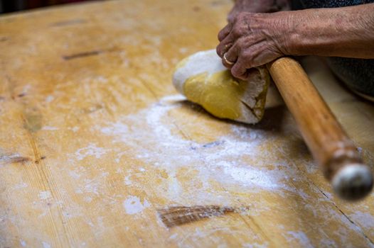 detail roll out the dough with a rolling pin and then make tagliatelle