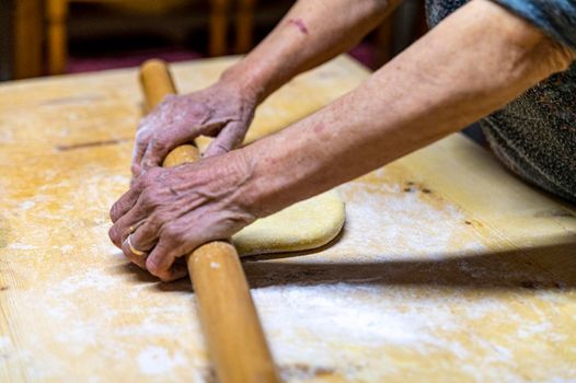 detail roll out the dough with a rolling pin and then make tagliatelle