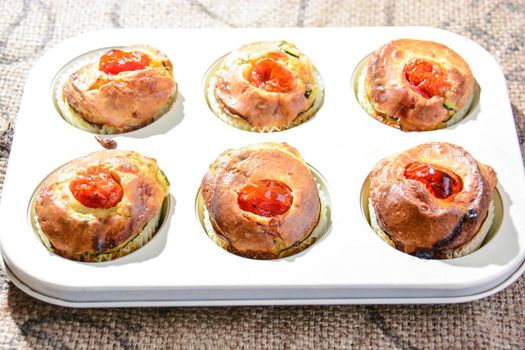 finger food of typical Italian cuisine muffins with homemade vegetables and ricotta