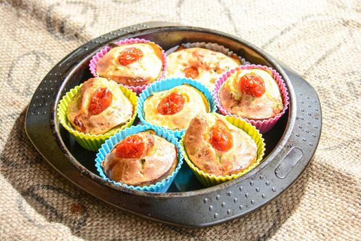 finger food of typical Italian cuisine muffins with homemade vegetables and ricotta