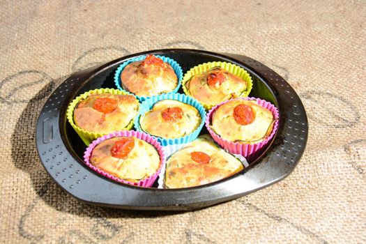 finger food of typical Italian cuisine muffins with homemade vegetables and ricotta