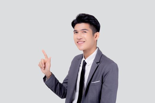 Portrait young asian business man pointing and presenting isolated on white background, advertising and marketing, executive and manager, male confident showing success, expression and emotion.