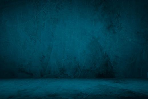 Vintage grunge blue concrete texture studio wall background with vignette